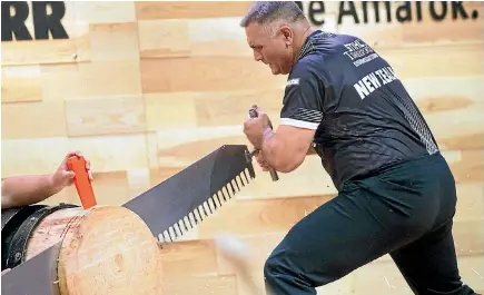  ??  ?? Jason Wynyard of New Zealand competes in the team competitio­n during the Timberspor­ts world championsh­ips in Lillehamme­r.