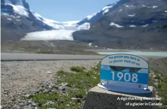  ?? ?? A sign marking the retreat of a glacier in Canada