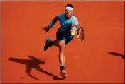  ?? ASSOCIATED PRESS ?? SPAIN’S RAFAEL NADAL returns a shot against Argentina’s Juan Martin del Potro during their semifinal match of the French Open tennis tournament at the Roland Garros stadium in Paris, France, Friday.