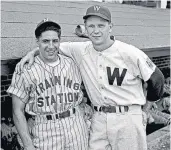  ??  ?? The Bluejacket­s’ Phil Rizzuto, left, and the Washington Senators’ Gene “Jerry” Priddy, pose on April 1, 1943.