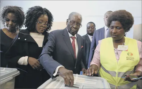  ??  ?? Ex- Zimbabwean leader Robert Mugabe casts his vote in Harare, Zimbabwe, but for once is not on the ballot himself.