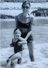  ??  ?? Life full of love: Melanie Smart as a young girl, with her mum