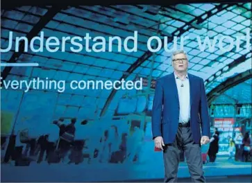  ?? Ethan Miller Getty Images ?? QUALCOMM CEO Steve Mollenkopf this month. His firm’s patent licensing business is being sued by Apple.