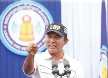  ?? HENG CHIVOAN ?? LDP leader Khem Veasna speaks to supporters during a campaign rally in May in Kandal’s Takhmao town.