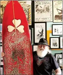  ?? The New York Times/THERESE AHERNE ?? The Irish surf pioneer and artist Barry Britton poses in his gallery in Rossnowlag­h, Ireland.