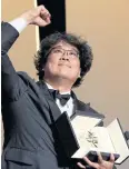  ??  ?? Director Bong Joon-ho with the Palme d’Or for Parasite last year.