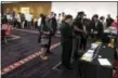  ?? ANNIE RICE — THE ASSOCIATED PRESS ?? People attend a job fair in Chicago.