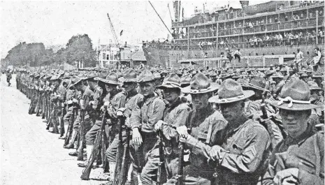  ?? NATIONAL WORLD WAR I MUSEUM AND MEMORIAL ?? U.S. troops arrive at St. Nazaire, France, on June 26, 1917. About 53,000 Americans died in combat in World War I.