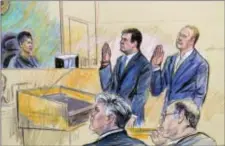  ?? DANA VERKOUTERE­N VIA AP ?? A court artist drawing shows President Donald Trump’s former campaign chairman, Paul Manafort, center standing and Manafort’s business associate, Rick Gates, in federal court in Washington, Monday before U.S. Magistrate Judge Deborah A. Robinson....