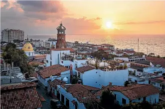  ?? ?? Made famous by the great love of Elizabeth Taylor and Richard Burton, the beautiful coastal city of Puerta Vallarta in Mexico is popular with daytripper­s.