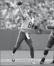  ?? AP/MIKE ROEMER ?? Minnesota Vikings quarterbac­k Kirk Cousins threw for 425 yards and 3 touchdowns as the Vikings tied the Green Bay Packers 29-29 on Sunday.