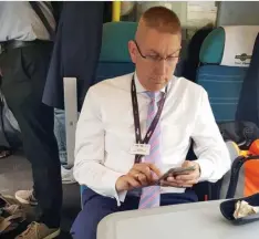  ??  ?? Under fire: Rail boss Mark Boon takes up two seats