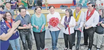  ?? PR ?? DAVAO CITY MAYOR Sara Duterte-Carpio leads the inaugurati­on along with SM Foundation’s executive director for health and medical programs Connie Angeles, and SMFI corporate affairs head Chito Macapagal.