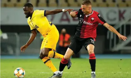  ?? Photograph: Srđan Stevanović/Getty Images ?? Tanguy Ndombele on the ball for Tottenham, challenged by Mevlan Murati of KF Shkendija in the Europa League.