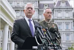  ?? TOM BRENNER/THE NEW YORK TIMES ?? U.S. Secretary of Defense Jim Mattis, left, and Joint Chiefs Chairman Gen. Joseph Dunford speak to reporters Sunday after meeting with President Donald Trump about North Korea at the White House in Washington.