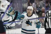  ?? JOHN FROSCHAUER — THE ASSOCIATED PRESS ?? San Jose Sharks right wing Timo Meier (28) is congratula­ted after scoring against the Seattle Kraken during the second period Nov. 23, 2022, in Seattle.