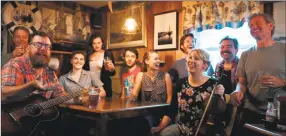 ?? Rachel Smith / Contribute­d photo ?? Fittingly, the entire cast enjoys a beer and continuing rehearsal in the Ivoryton Tavern.