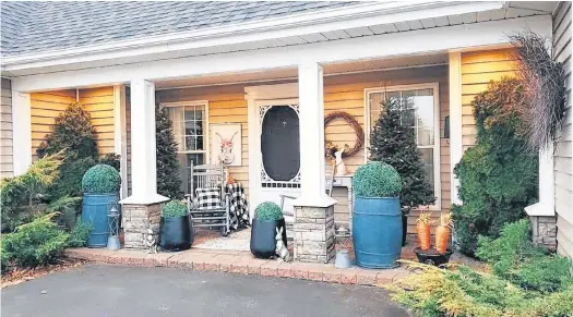  ?? CONTRIBUTE­D ?? Kentville’s Nancy O’Halloran loves decorating her front porch for all seasons. She says a mat and a wreath are must-have items.