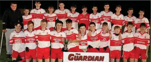  ??  ?? The successful Ballinastr­agh Gaels squad with the Seán Ferguson Memorial Cup after Wednesday’s final in St. Patrick’s Park.