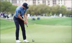  ?? Steve Dykes / Getty Images ?? Jordan Spieth putts on the 17th green during the final round of Valero Texas Open at TPC San Antonio on Sunday.