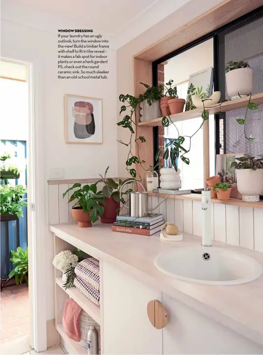  ??  ?? window dressing
If your laundry has an ugly outlook, turn the window into the view! Build a timber frame with shelf to fit in the reveal – it makes a fab spot for indoor plants or even a herb garden! PS, check out the round ceramic sink. So much sleeker than an old-school metal tub.