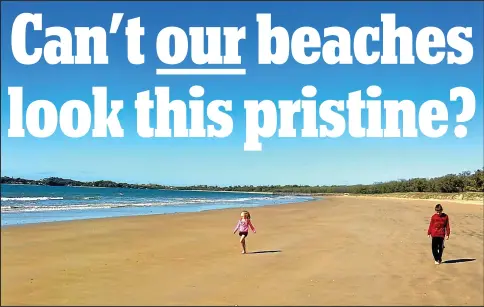  ??  ?? Clean sweep: Felicity and Casey enjoy the freedom of playing on a litter-free beach in Queensland, Australia