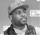  ?? CURTIS COMPTON/AP ?? Former Falcons and Eagles quarterbac­k Michael Vick is working with the LeBron James-led political empowermen­t group, More Than A Vote, and the Florida Rights Restoratio­n Coalition to help other former felons pay fines that are preventing them from voting. His journey is being chronicled in a new documentar­y miniseries.