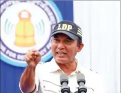  ?? HENG CHIVOAN ?? LDP leader Khem Veasna speaks to supporters during a campaign rally in Kandal’s Takhmao town last year.