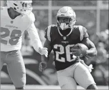  ?? WINSLOW TOWNSON/AP PHOTOS ?? The Patriots’ Sony Michel runs against the Miami during Sunday’s 38-7 win at Gillette Stadium. The Patriots host Indianapol­is tonight.