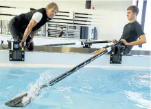  ?? CLIFFORD SKARSTEDT/EXAMINER FILES ?? Row to Podium coach Carol Love works with protege Trevor Jones, then a Lakefield College School student and now a world championsh­ip medalist, on Nov. 28, 2014 at Trent University's Athletics Facility. Rowing Canada announced Thursday that Trent...