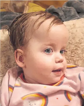  ?? ?? YOUNG WARRIOR: Forfar toddler Kinsley Mcmillan is the ‘boss of the family’ as she faces a high-risk 16-hour operation after bravely battling a rare form of brain tumour