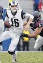  ??  ?? JARED GOFF steps up to throw for 355 yards and three third-quarter touchdowns against Brennan Scarlett and Houston.