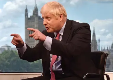  ??  ?? Fighting back: Boris tried to turn the tables by criticisin­g the BBC’s Brexit coverage