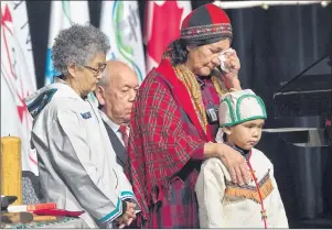 ?? CP PHOTO ?? Elders offer prayers before Prime Minister Justin Trudeau delivered an apology on behalf of the Government of Canada to former students of the Newfoundla­nd and Labrador Residentia­l Schools in Happy Valley-Goose Bay, N.L. on Friday.