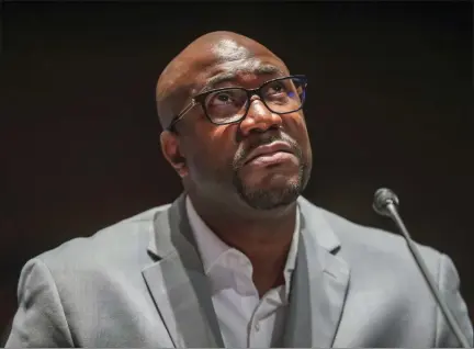  ?? MICHAEL REYNOLDS — THE ASSOCIATED PRESS ?? Philonise Floyd, brother of George Floyd, looks up as he delivers his opening statement during a House Judiciary Committee hearing on Wednesday, June 10, on Capitol Hill in Washington.