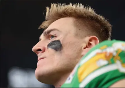  ?? CHRISTIAN PETERSEN — GETTY IMAGES ?? Oregon quarterbac­k Bo Nix speaks with the media following the Fiesta Bowl against the Liberty Flames at State Farm Stadium on Jan. 1in Glendale, Ariz.