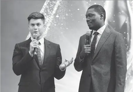  ?? CHRIS PIZZELLO/THE ASSOCIATED PRESS ?? Saturday Night Live veterans and 70th Emmy Awards co-hosts Colin Jost, left, and Michael Che have simple goals — they just want to have some fun and make sure all the people in the audience and those watching from home have a good laugh.