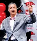  ?? MICHAEL WOODS/THE ASSOCIATED PRESS ?? John Calipari answers questions Wednesday after being introduced as Arkansas men’s basketball coach in Fayettevil­le, Ark. The Hall of Fame coach announced Tuesday he had resigned as coach for Kentucky.