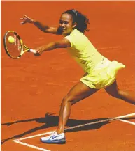  ?? CLIVE BRUNSKILL / GETTY IMAGES ?? Canada's Leylah Fernandez plays a backhand against Andrea Petkovic of Germany on Friday in her 6-1, 1-6, 6-4
victory at the Mutua Madrid Open in Spain.