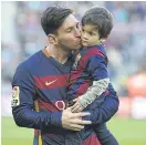  ??  ?? Lionel Messi and his son Thiago.