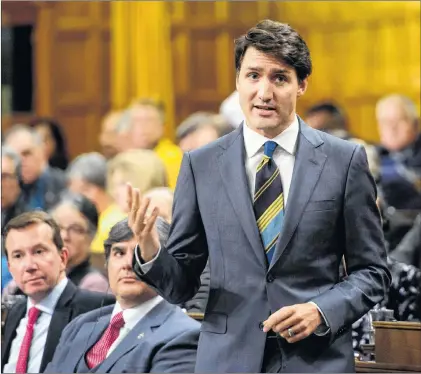  ?? CP PHOTO ?? Prime Minister Justin Trudeau stands during question period in the House of Commons on Parliament Hill in Ottawa on Wednesday.