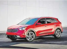  ?? Kia Niro je hybridní vůz, který se svou velikostí řadí kamsi mezi klasický hatchback Cee'd a oblíbené SUV Sportage. FOTO KIA ?? Kia Niro.