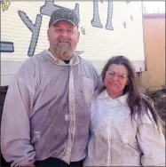  ?? Staff photograph by Sally Carroll ?? Beekeepers Patrick and Kelly Edwards are focused on helping others learn how to be successful beekeepers.