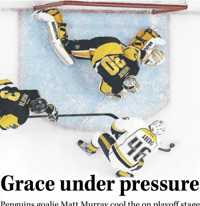  ?? AP PHoTo ?? Above: Nashville Predators’ Pontus Aberg prepares to shoot the puck past Pittsburgh Penguins goalie Matt Murray for a goal during the first period of Game 2 of the Stanley Cup Final on Wednesday in Pittsburgh.