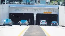  ?? JOE CAVARETTA/SOUTH FLORIDA SUN SENTINEL ?? Cars travel through Federal Highway’s Henry E. Kinney Tunnel on Sunday. Big changes are coming at 7 a.m. Tuesday when crews begin working on an improvemen­t project that will not wrap up until late 2023.
