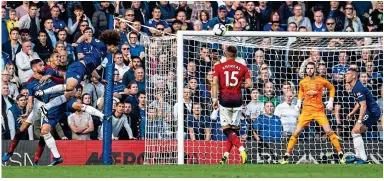  ?? LIAM McAVOY/UK SPORT PICS ?? Bullet: David Luiz heads towards goal to set up Ross Barkley’s equaliser