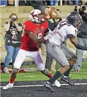  ?? [AP PHOTO] ?? Oklahoma State’s A.J. Green, right, was flagged for pass interferen­ce against Texas Tech, one of three such penalties against the Cowboys in their last game.