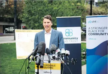  ?? MIKE BELL ?? Speaking at Emery Barnes Park on Friday, Mayor Gregor Robertson says 1,000 new units of affordable rental housing will be built on seven city-owned sites. Rents will be below market and tied to income.