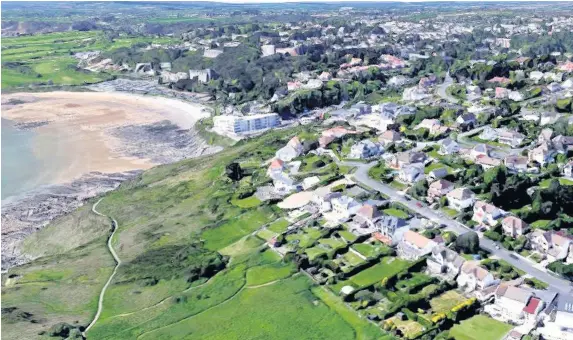  ?? Google Earth ?? > St Annes Close in Swansea is the only million-pound street in Wales, with an average price of £1,029,000