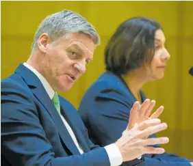  ?? Photo / Mark Mitchell ?? Sir Bill English and wife Dr Mary English make submission­s on the End of Life Choice Bill yesterday.